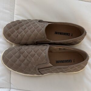 Tan flat shoes, with white bottom lightly worn